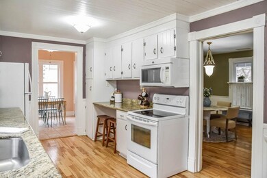 Fully applianced kitchen with a bar seating and a 