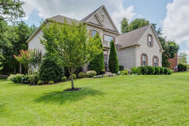 Gorgeous inside and out with all brick exterior, flat private yard, beautifully landscaped with mature trees. 