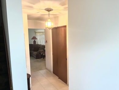 Foyer open to LR and Kitchen