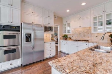 All stainless appliances and double oven make cook