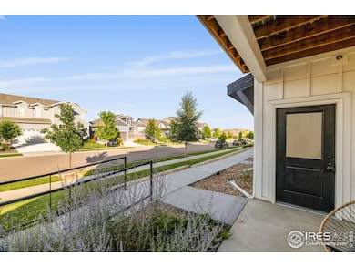 Quiet location - front to grassy open space and peaceful views of single-family homes across the street.