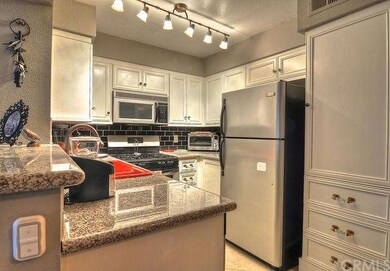 Granite countertops, subway tile backsplash, custo