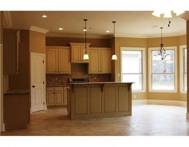 Kitchen. Another view of the kitchen and bay windo