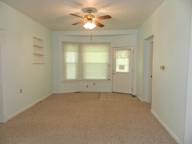 Living room also has a curve in windows