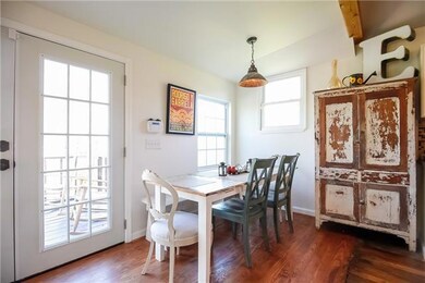 Enjoy your meals with family and friends in this warm dining area.