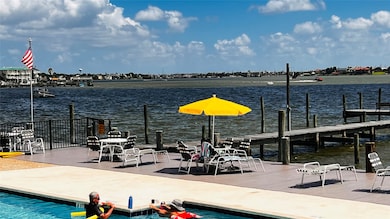 This waterfront property features a swimming pool