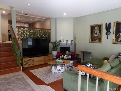 Stepdown Spacious Living Room with Fireplace