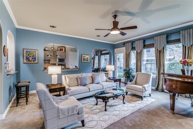 Living Room with views into the kitchen and breakfast area.