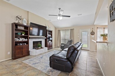 Warm and inviting white brick fireplace is a cozy 