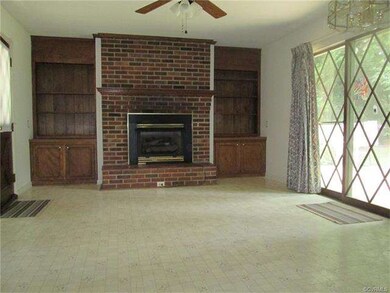 Fireplace in kitchen and sitting area