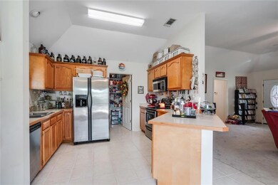 Kitchen has stainless appliances, freshly cleaned