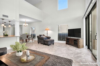 This spacious Living are has updated tile windows