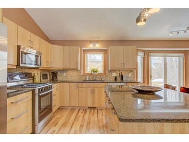 Kitchen with maple cabinets, granite countertop an