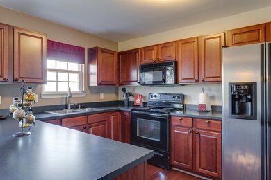 This kitchen boasts a new stainless steel Kitchenaid dishwasher