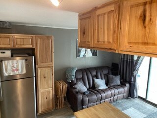 Living room with kitchen built-ins