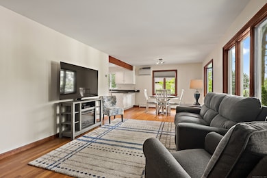 Living Room opens to Dining area & Kitchen
