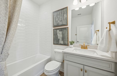 Stylish secondary bath with high-end fixtures *Model representation
