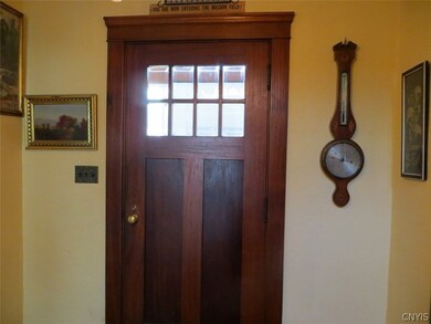 Windowed front door from foyer