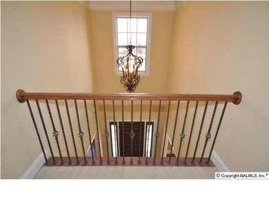 TWO STORY FOYER.