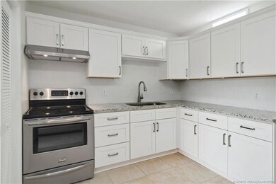 New white, shaker style wood cabinets