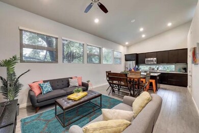 Living area with lofted ceiling, recessed lightin