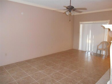 FAMILY ROOM - view of back door leading to the cov