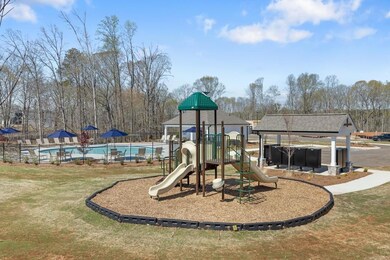 Communal playground with a community pool