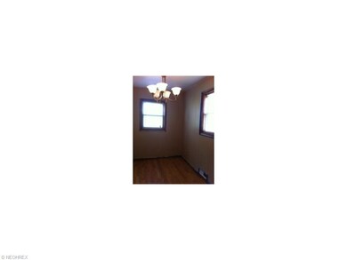 freshly painted Dining area with laminate flooring