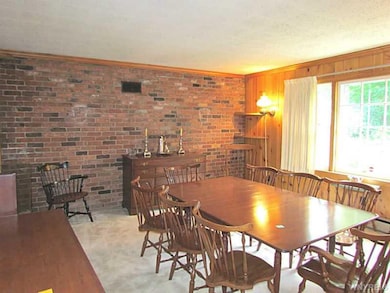 Dining Room. Spacious dining room with knotty pine