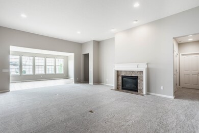 Spacious Great Room with Gas Log Fireplace with Mantle