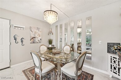 Dining room featuring an inviting chandelier and a