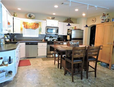 Generous size kitchen with white solid wood cabine