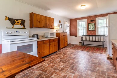 Eat-In Kitchen with Plenty of Work Space and Storage