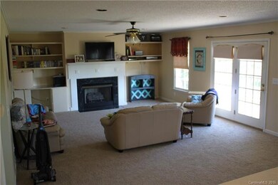 Open living room area with New Carpet, Built ins &