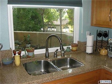 Stone Counters and Stainless Steel Sink, too