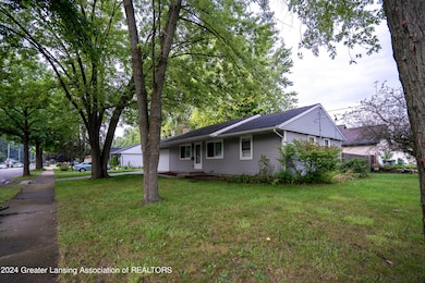 3227 Sunderland Rd, Lansing, MI 48911 - photo 2