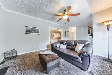 living room off of front entry and kitchen/dining