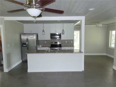 Kitchen, dining open to great room