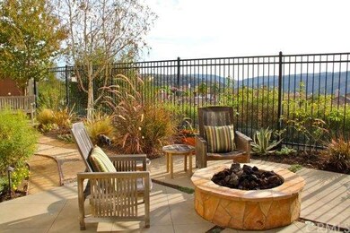 Tranquil backyard with zeriscape gardens and a bre