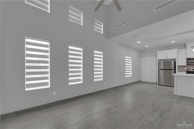 Unfurnished living room with light hardwood / wood-style flooring