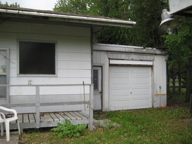 Garage has exit door to back yard