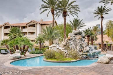 Pool with a patio area