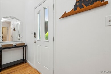 Doorway to outside featuring light wood-type floor