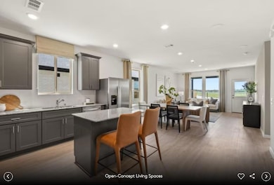 Interior photos- Photo of Pulte model home with same floor plan, not of actual home listed.