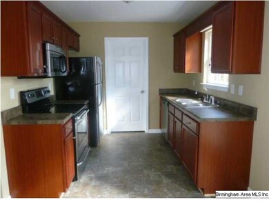 ALL STAINLESS APPLIANCES INCLUDING REFRIGERATOR IN