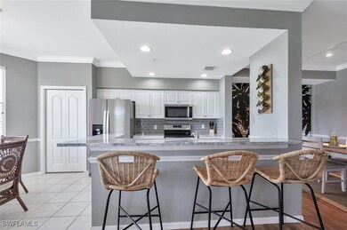 Kitchen featuring appliances with stainless steel