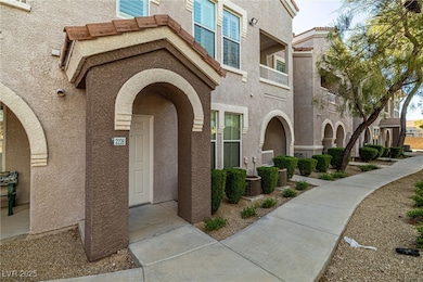 View of exterior entry with stucco siding