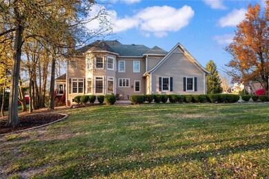 Back w/ double bay window areas & screeened in por