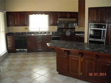 Maple cabinets in average to good condition. Appli