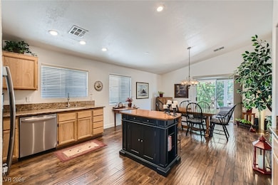 Kitchen featuring stainless steel dishwasher, a si